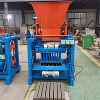 Petite machine manuelle semi-automatique mobile de fabrication de briques de pavage à emboîtement machine de fabrication de blocs creux en béton de ciment