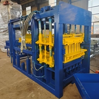 Machine de fabrication de briques entièrement automatique à fonctionnement continu avec mélangeur et alimentateur intégrés pour la production de blocs