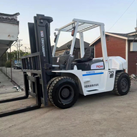 Chariot élévateur diesel d'occasion TCM FD70 de 7 tonnes, vitesse de déplacement de 20 km/h, rayon de braquage de 2,82 m, pour la logistique industrielle, le commerce d'exportation