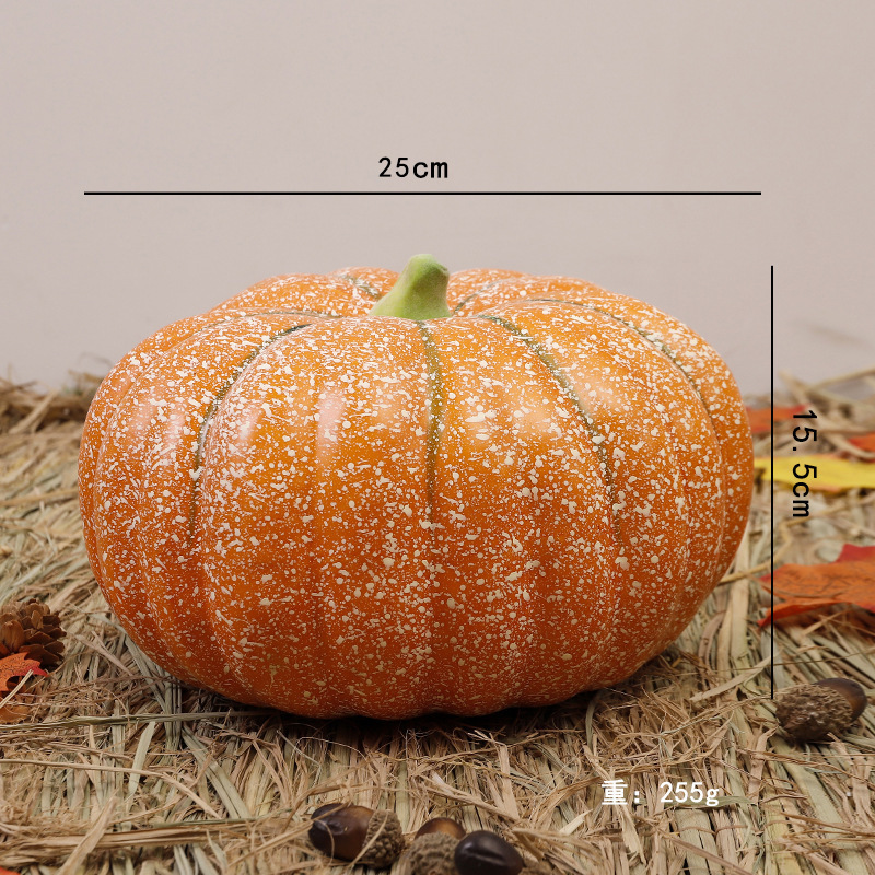 Calabaza enana amarilla de 25 cm con copos de nieve.