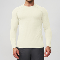 T-shirt de sport à manches longues sans coutures pour homme, haute qualité, séchage rapide, idéal pour la course, le yoga et l'entraînement, haut de compression pour l'exercice