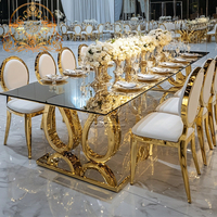 Tables à manger modernes de style indien avec plateau en verre et base en acier inoxydable sculpté, pour les salles de réception, les mariages, les hôtels, de bonne qualité