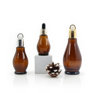 Flacon compte-gouttes <span class=keywords><strong>en</strong></span> verre ambré <span class=keywords><strong>en</strong></span> forme de <span class=keywords><strong>gourde</strong></span> de 10 ml à 100 ml, conteneur pour huile essentielle et sérum, emballage personnalisé pour soins de la <span class=keywords><strong>peau</strong></span> avec bouchon à vis et logo sur mesure - Product Image 2