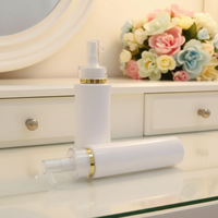 Flacon vide de luxe en plastique PET blanc 120ml 150ml pour lotion corporelle, shampoing, après-shampoing avec pompe dorée et bouchon à vis sérigraphié