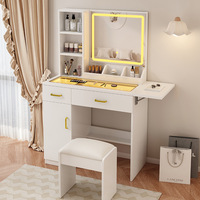 Meuble de rangement avec miroir éclairé et panneau en verre, intégré à une petite table de maquillage, style moderne pour la maison et le bureau, pour le commerce extérieur.