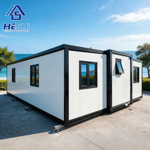 บ้านคอนเทนเนอร์ HESHI แบบสำเร็จรูป โมดูลาร์ ดีไซน์เรียบง่าย รูปทรงสี่เหลี่ยมผืนผ้า สีขาวตกแต่งขอบสีดำ - Product Image 1