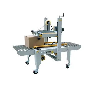 Hot sell automatic boxes sealer machine for cartoon boxes