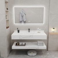 Meuble-lavabo de salle de bain double couche en marbre de luxe minimaliste avec vasque en pierre frittée et miroir intelligent pour hôtel