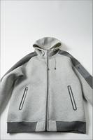 Sweat à capuche zippé color block pour homme OEM |   Veste à capuche athlétique décontractée multi-poches pour les déplacements en plein air et le quotidien