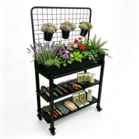 Jardinière surélevée mobile en métal avec treillis, 3 pots suspendus et étagères de rangement à double niveau pour jardinage extérieur