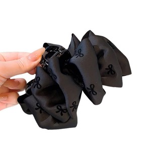 High-end black bubble <b>bow</b> hair <b>clip</b> for women with voluminous hair, perfect for updos. - Product Image 5