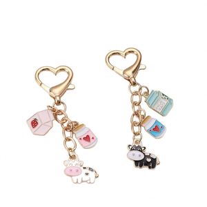 Nouveau porte-clés en alliage de zinc doré en forme de cœur pour animaux de compagnie, petit pendentif vache, accessoire de sac - Product Image 6