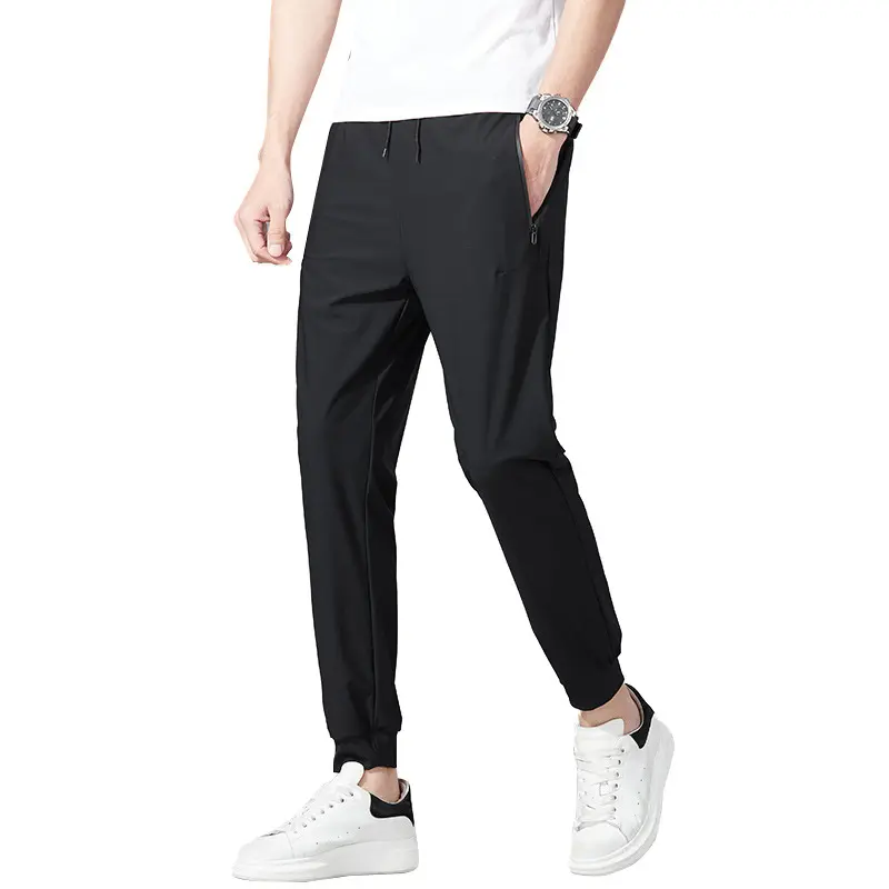 Summer thin style men's nine-quarter pants Korean fashion slim slim feet men's quick-dry pants ice silk stretch casual pants men