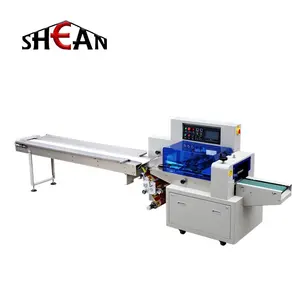 Automatic flow pillow type rock sugar packing filling and sealing machine.