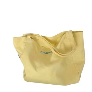 กระเป๋าผ้าแคนวาสสะพายไหล่คู่สีลูกกวาดสไตล์ญี่ปุ่นเกาหลี พร้อมช่องใส่ของด้านในสำหรับโทรศัพท์มือถือและกระเป๋าช้อปปิ้ง - Product Image 1