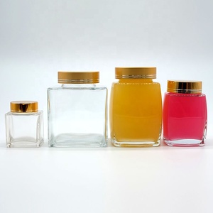 50ml 100mL 180ml 280ml 360ml 750ml Botella de miel de vidrio de forma cuadrada única Proveedor de tarros con tapa dorada utilizada para mermelada de pudín de miel - Product Image 3