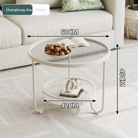 Table basse moderne en verre double couche avec rangement et structure métallique pour petits appartements