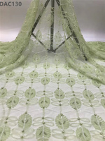 Tissu en dentelle brodée de perles de haute qualité, motif feuilles, tulle floral élastique brodé pour vêtements féminins