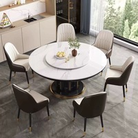 Mesa de Comedor Redonda Moderna de Lujo con Tapa de Piedra Sinterizada y Base de Pedestal Escultural con Detalles en Dorado para Muebles de Villa