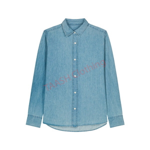 เสื้อเชิ้ตยีนส์ทรงหลวม ให้การเคลื่อนไหวที่ง่ายดายและสไตล์ที่เรียบง่าย เหมาะสำหรับความสบายในวันธรรมดาและการสวมใส่ในวันหยุดสุดสัปดาห์ - Product Image 1