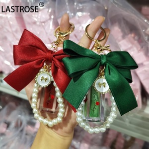 Kit <span class=keywords><strong>Olio</strong></span> Labbra Lucido al Gusto Frutta che Cambia Colore, Vegano, con Etichetta Privata e Portachiavi a Fiocco - Ingrosso - Product Image 2