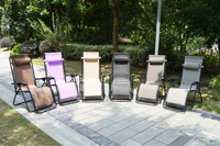 Vente en gros de tissu à bas prix pour l'extérieur Fauteuil de bronzage inclinable et pliable léger pour le camping Zero Gravity Beach