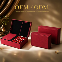 Boîte d'emballage personnalisée en cuir PU rouge pour sachets de thé chinois, avec fermoir doré, plateau intérieur doublé de velours et compartiments, coffret cadeau