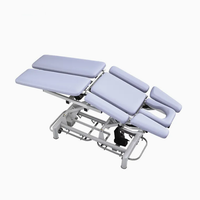 Table d'examen gynécologique électrique multifonctionnelle réglable et pliable en acier inoxydable avec écran LED certifiée CCC