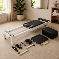 Machine de Pilates professionnelle en aluminium avec plateforme de saut, boîte d'assise et système de cordes réglables pour studio et salle de sport