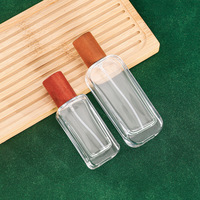 Emballage de bouteille de parfum à faible quantité minimale de commande de 30ml bouteille vide de parfum en verre bouteille de parfum élégante de 50ml avec bouchon en bois