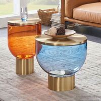 Table basse ronde en verre teinté