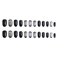 Faux ongles en acrylique noir effet œil de chat brillant, forme ovale longue avec dégradé argenté scintillant, paillettes foncées pour une esthétique audacieuse