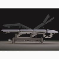 Table d'examen gynécologique électrique multifonctionnelle réglable et pliable en acier inoxydable avec écran LED certifiée CCC