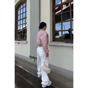 เสื้อแจ็คเก็ตสตรีสีชมพูพาสเทลพิมพ์ลายสไตล์วิทยาลัย - Product Image 1