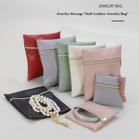 Pochette à bijoux en cuir PU, mini pochette zippée pour boucles d'oreilles, colliers, bracelets, fermeture éclair dorée, doublure douce, pochettes de voyage, couleurs assorties