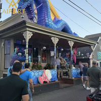 Dragon gonflable bleu foncé, modèle géant et effrayant pour la décoration de repères urbains, l'affichage d'activités en bar