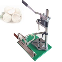 Presse à noix de coco manuelle, machine à ouvrir, à peler et à couper les noix de coco vertes