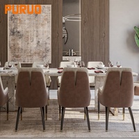 Table à manger ovale Puruo Light Luxury avec plateau asymétrique sur une base de table à manger à 3 pieds en or massif