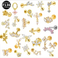 Anting-anting tusuk titanium F136 dengan desain bunga, daun, burung, capung, kupu-kupu.  Berhiaskan CZ dengan ulir dalam.