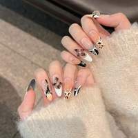 Faux ongles à presser faits main en amande, 10 pièces, ABS, rose nude brillant, motif léopard avec strass, ongles français noirs