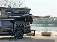 Mini-caravane pliante Pioneer en aluminium léger avec capacité pour 4 personnes et équipement de cuisine