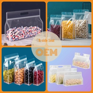 Customized Clear Bopp Pillow <b>Bags</b> <b>Snack</b> Candy Packaging Reusable Food Grade Stand Up Zip Lock Packaging Pouch <b>Bag</b> Handle - Product Image 2