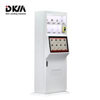 Distributeur automatique intelligent DKM à écran tactile de 23,6 pouces avec paiement par carte de crédit pour les pièces de monnaie souvenirs