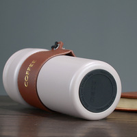 Mug isotherme à double paroi en acier inoxydable 18/8 de 17 oz avec logo personnalisé Emerit 2026 et sangle de transport pour la vente en gros