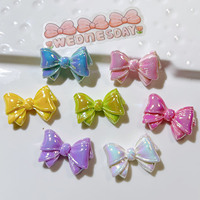 Breloques en résine nacrées dégradées en forme de nœud, très populaires - Embellissements brillants multicolores en forme de nœud pour coques de téléphone DIY et pinces à cheveux