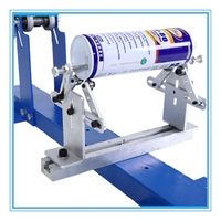 Machine d'impression sérigraphique manuelle pour bouteilles et cylindres, pour l'impression d'étiquettes sur papier cartonné