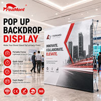 Mur d'affichage pop-up polyvalent FEAMONT pour salle d'exposition et zone de réception d'entreprise avec système en aluminium réutilisable et graphisme personnalisé