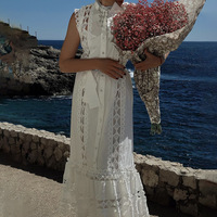 Robe midi sans manches à col montant, style français, unie, pour femme, nouvelle collection printemps 2025, design épuré, taille évidée, effet amincissant