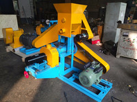 Machine de traitement des aliments Machine à fabriquer des céréales extrudées, du riz, du maïs soufflé, des sucettes pop, des collations en vente
