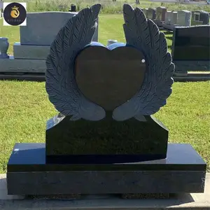 Monument en granit gris foncé naturel en forme de cœur sculpté d'ailes